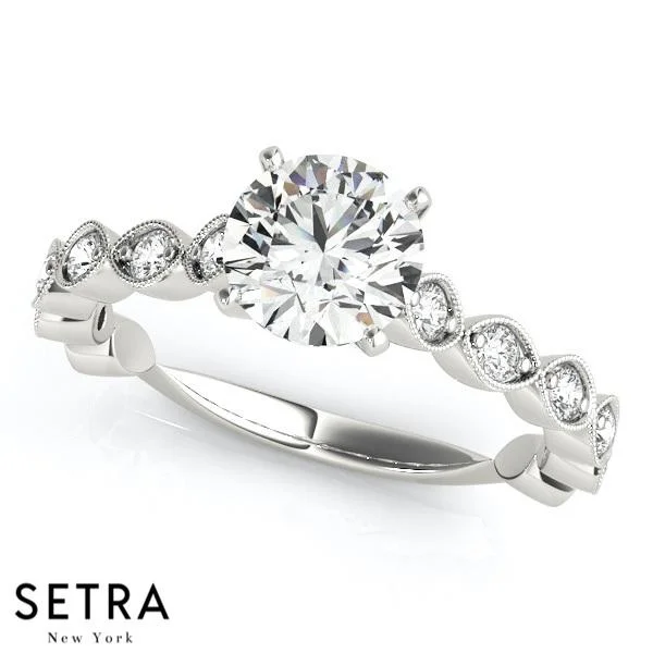 ENGAGEMENT RINGS SINGLE ROW PRONG