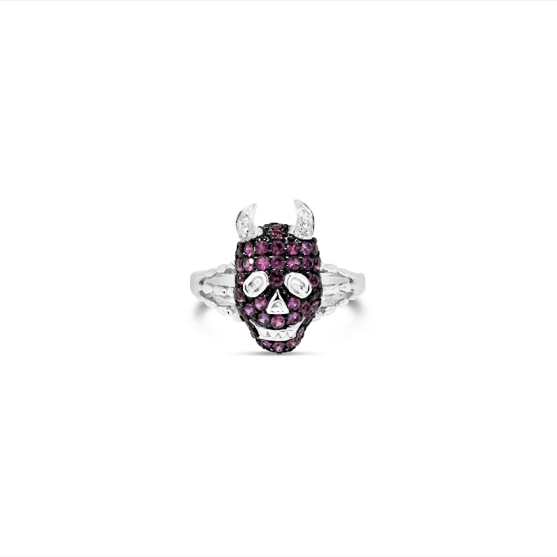 18KT WHITE GOLD PINK SAPPHIRE AND DIAMOND DEVIL RING.