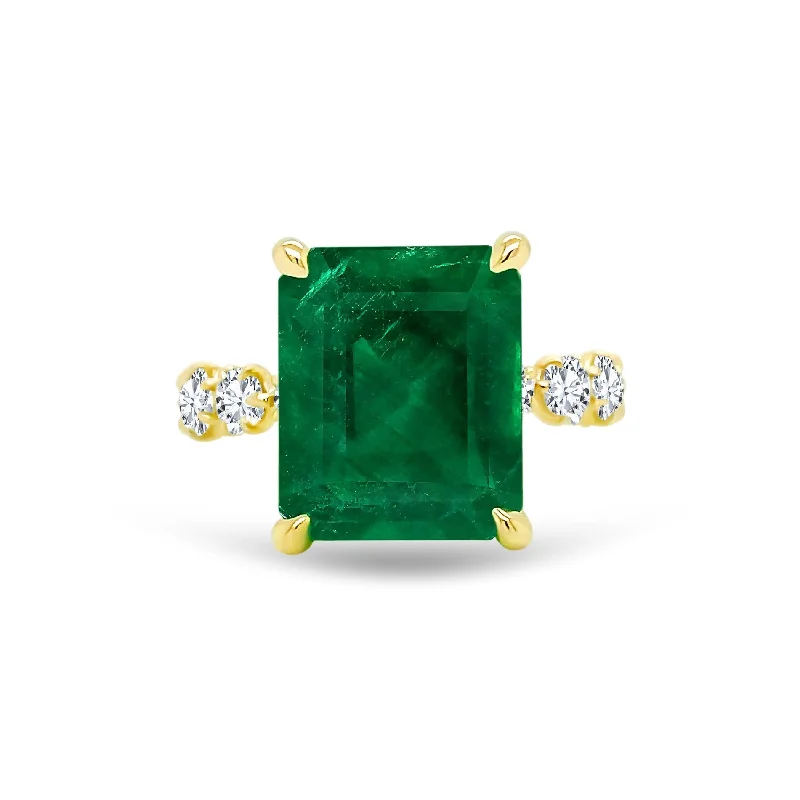 Emerald Cut Gemstone Solitaire On Eagle Prong Diamond Band