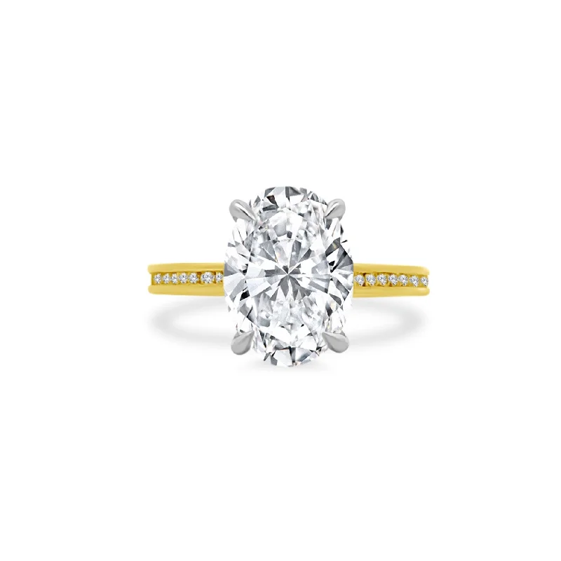 Oval Cut Solitaire on Channel Set Diamond Band