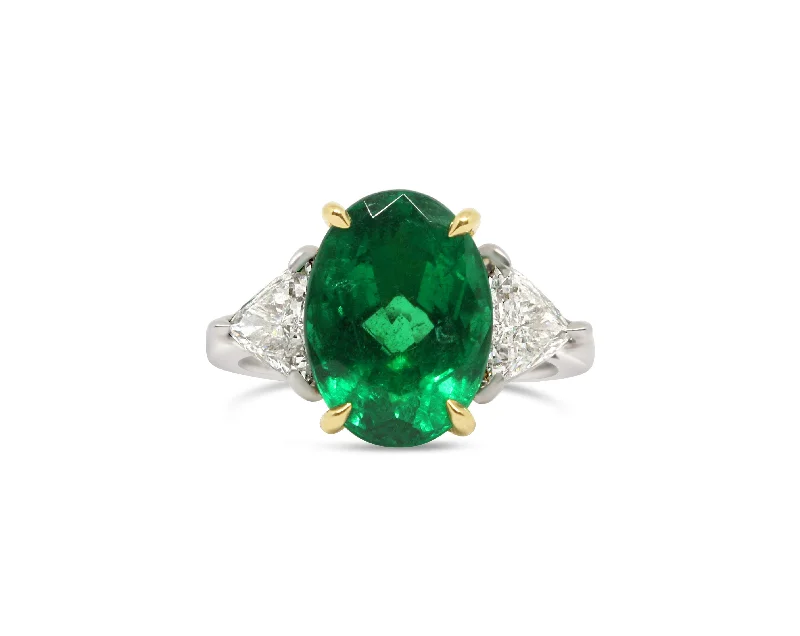 PLATINUM EMERALD AND DIAMOND RING